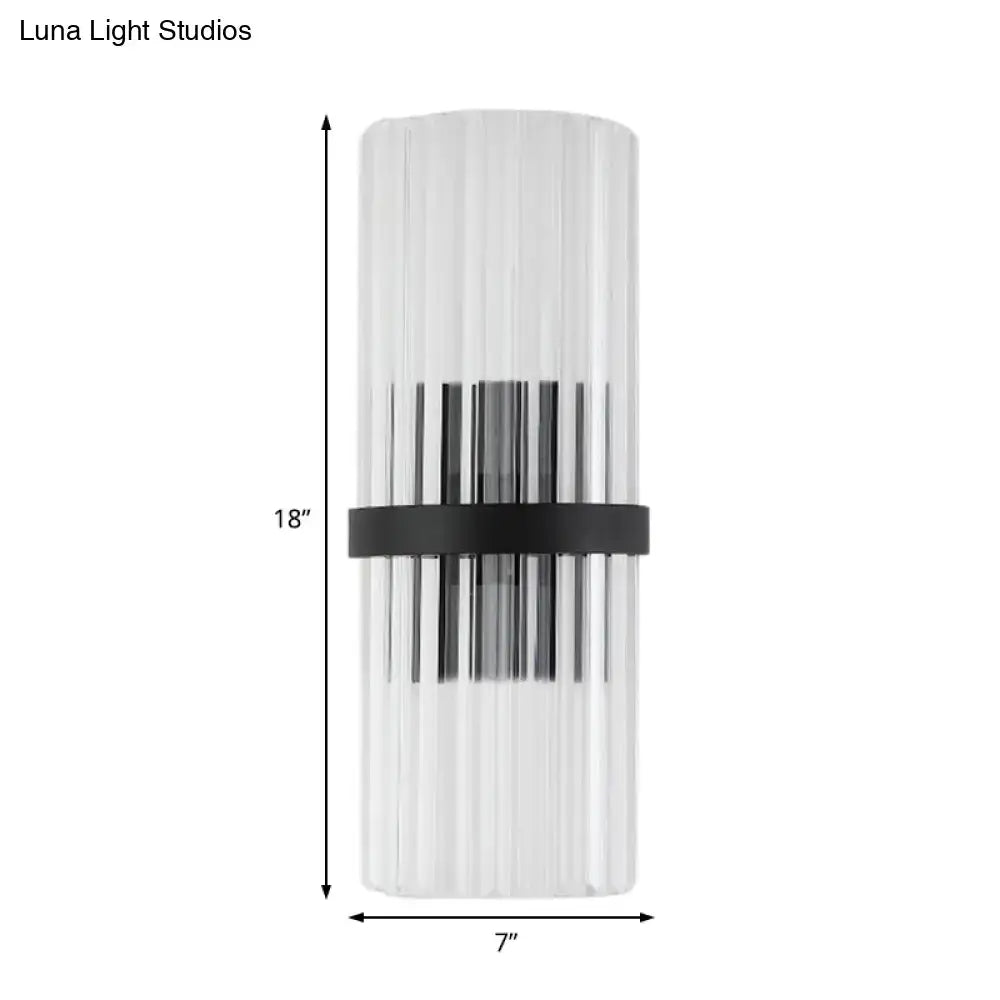 Modern black metal and crystal pipe dining room wall sconce with clear glass cylinder and e12 e14 bulb base vertical ridges