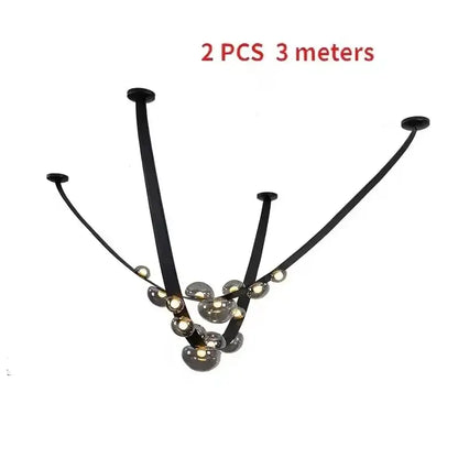 Modern black metal chandelier pendant light with curved arms and globe glass bulbs for designer leather loft decorbites decor