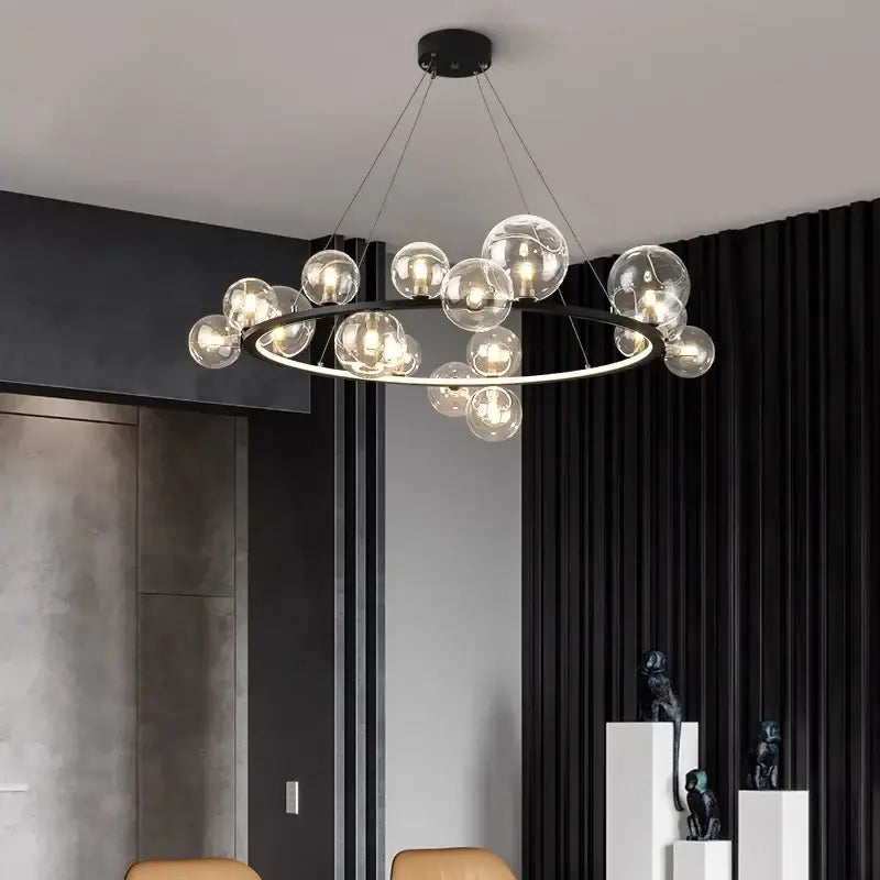 Modern black metal chandelier with clear glass led globe bulbs arranged in a circular pattern for dining room decorbites clear glass