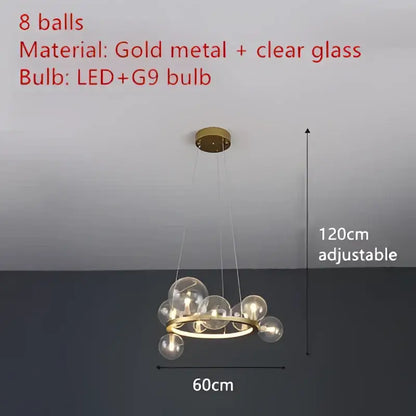 Modern gold metal chandelier with eight clear glass spheres from decorbites clear glass led dining room light