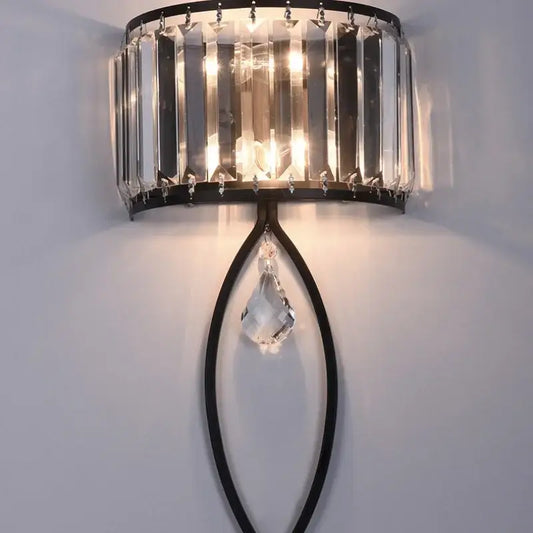 Modern black metal led wall lamp with vertical crystal rods and faceted crystal pendant for living room