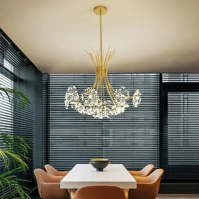 Modern black metal dandelion chandelier with gold-toned sculptural arms and cascading crystal elements by decorbites dandelion chandelier