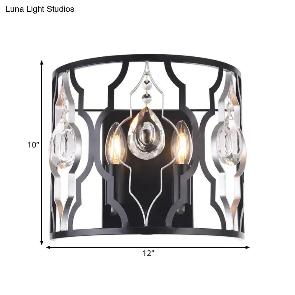 Modern black metal frame wall sconce with crystal droplets featuring three illuminated bulbs for bedroom lighting