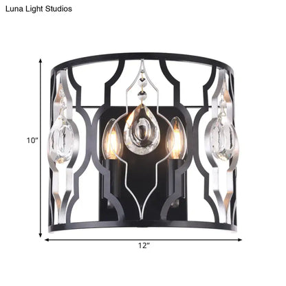 Modern black metal frame wall sconce with crystal droplets featuring three illuminated bulbs for bedroom lighting