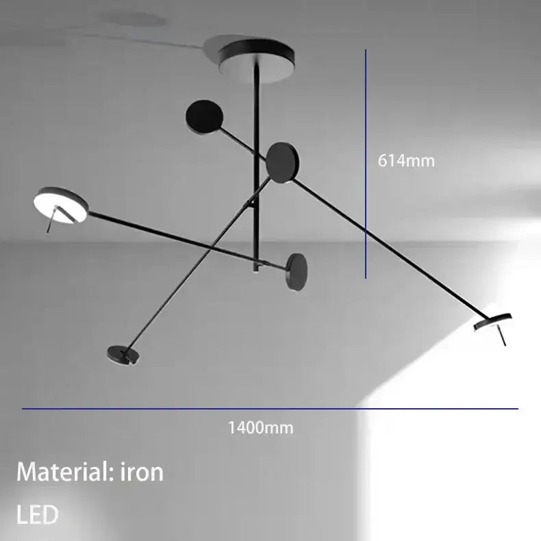 Modern black metal led chandelier with five circular led light fixtures in an asymmetrical living room design by decorbites black metal