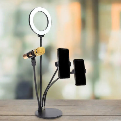 Black adjustable metal led stand with circle mirror, flash lighting, gold microphone mount, and dual phone holders for recording