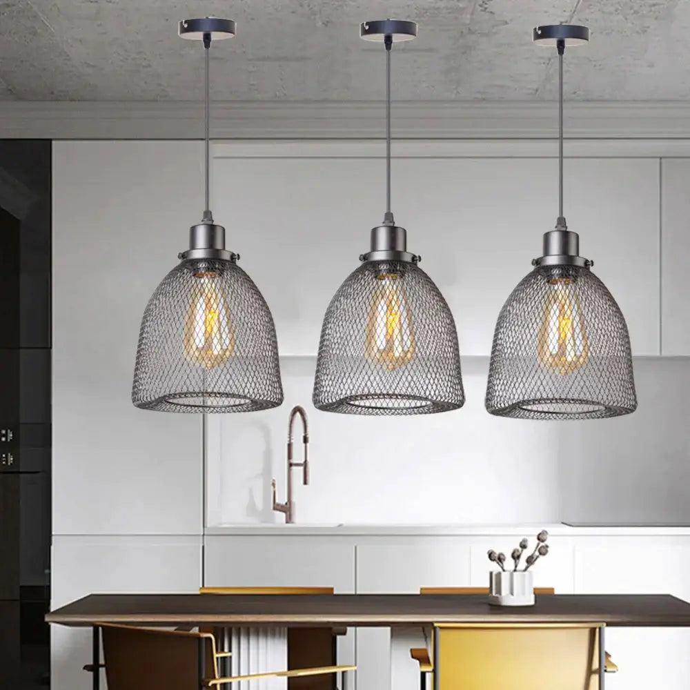 Three modern black metal mesh pendant light chandelier with exposed filament bulbs for dining room lighting