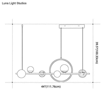 Modern black metal pendant light with spherical glass bulbs and geometric circular design for dining room