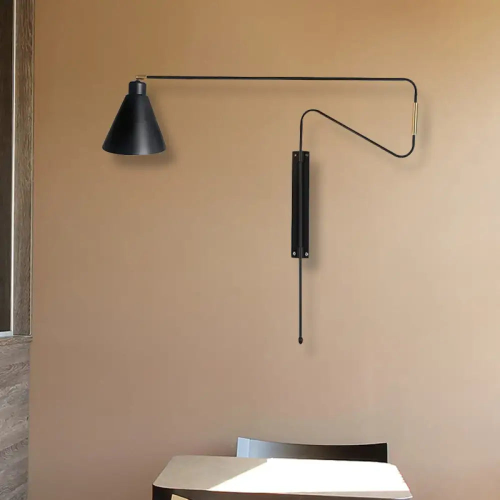 Modern black metal wall lamp with sleek articulated arm and conical shade for living room lighting