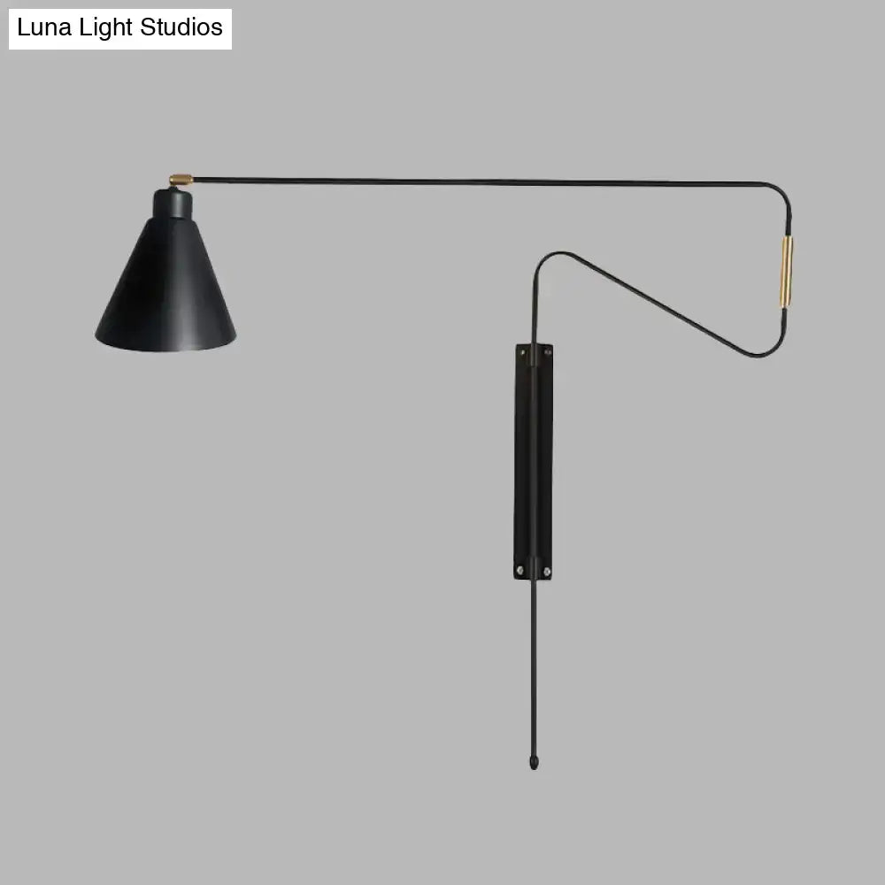 Modern black metal wall lamp with long articulated arm conical shade and black gold hardware for living room