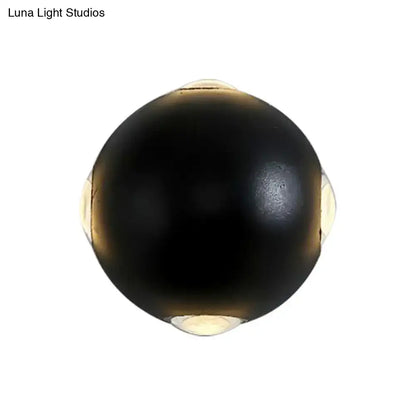 Modern black metal wall light outdoor spherical sconce with integrated warm-toned led direct wired electric lighting