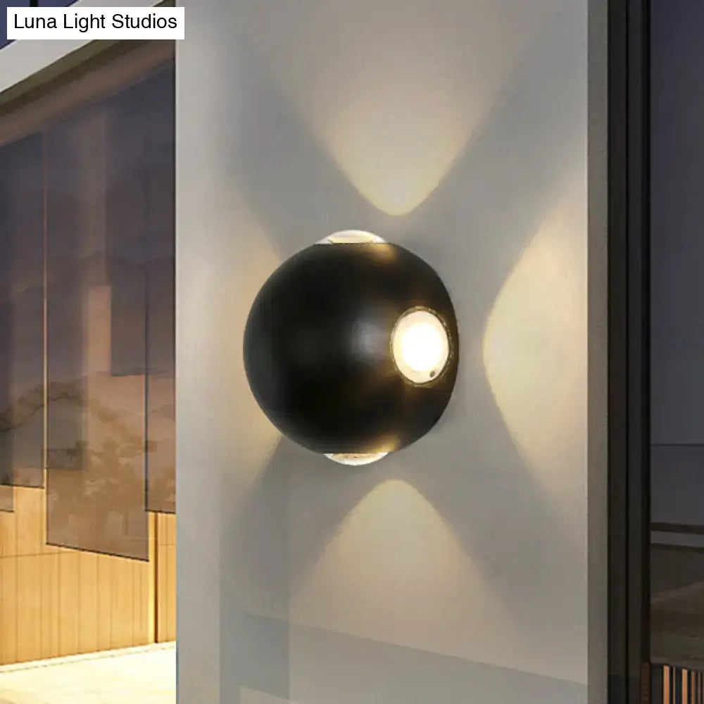 Modern black metal wall light direct wired electric spherical sconce with matte finish and dual warm beam light sources