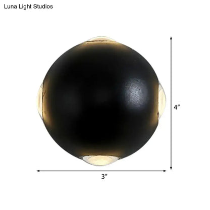 Modern black metal wall light outdoor spherical sconce with direct wired electric and warm glowing led accents