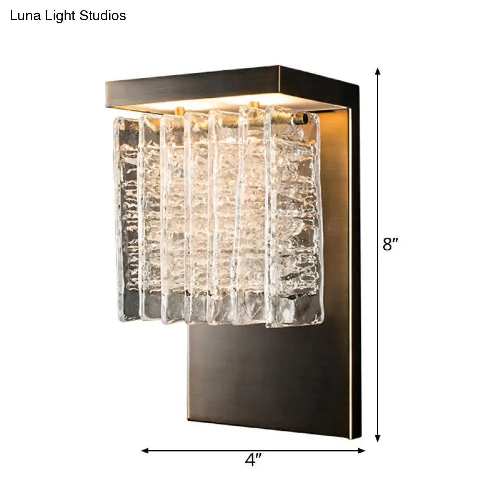 Modern black metal wall sconce with brushed bronze frame and crystal prism clear glass panels 12 inch fixture for living room