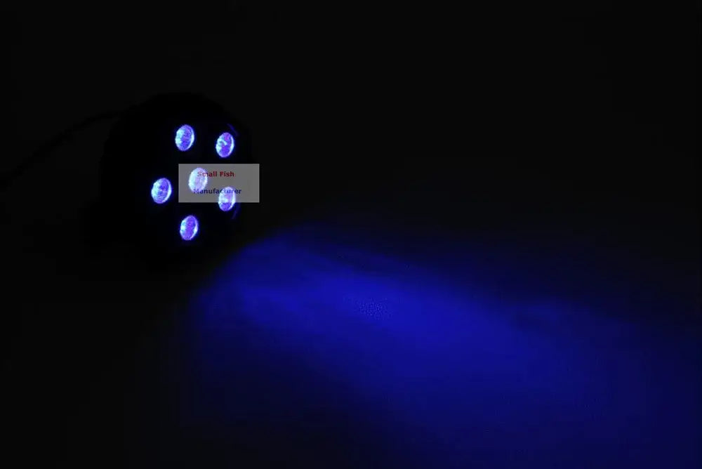 Black circular modern mini led flat par lights with five blue bulbs emitting strong ultraviolet-blue illumination