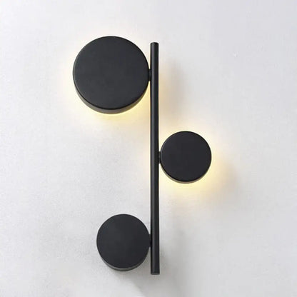 Modern black minimalist circle wall mount led sconce with three circular lights for living room wall decor