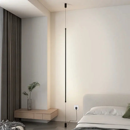 Modern black minimalist led floor lamp featuring a sleek vertical pendant design ideal for living room lighting