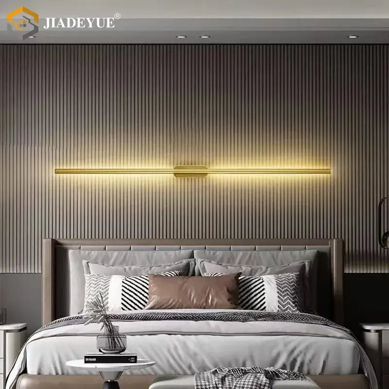 Gold-toned linear wall lamp with sleek modern design decorbites led wall lamp for warm ambient bedroom lighting