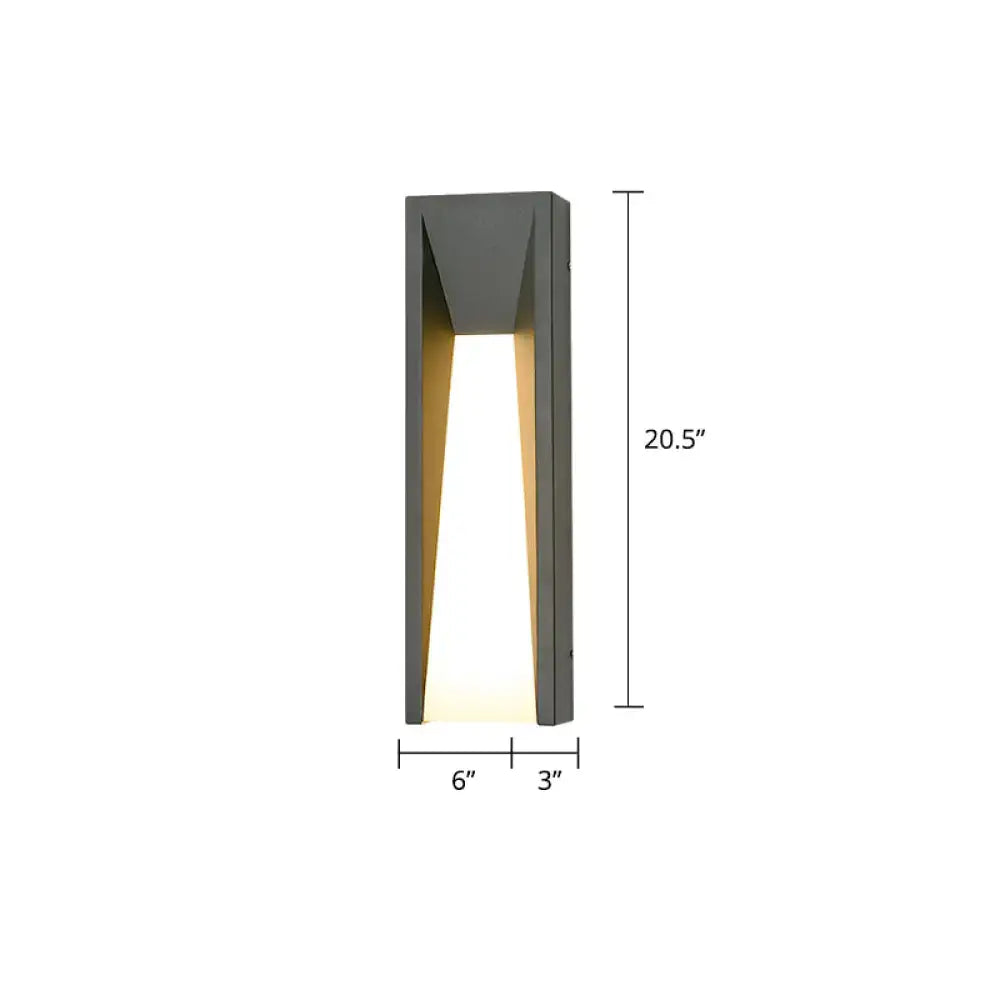 Modern black minimalist wall light with gray angular led sconce design emitting warm light for courtyard use
