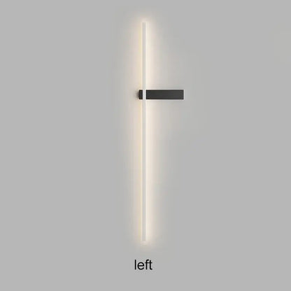 Minimalist black led wall sconce with sleek vertical light bar emitting warm white illumination decorbites led wall lights