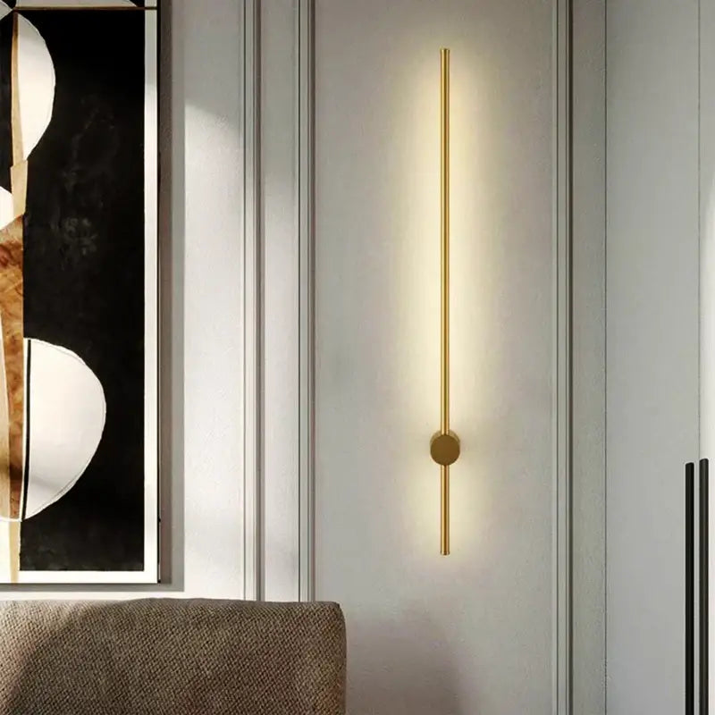 Modern black minimalist rotatable led wall light with gold-toned vertical bar and warm ambient led wall lights for bedroom