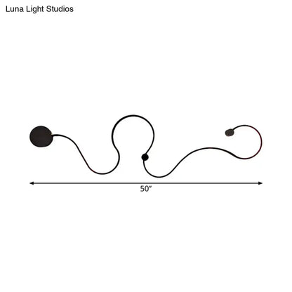 Modern black minimalist wall lamp with sleek curved wire design and two spherical shades providing white light