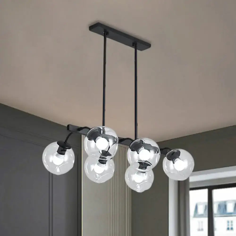 DecorBites™ 6/8-light modern black metal chandelier with clear glass globe bulbs and black orb shade for kitchen use