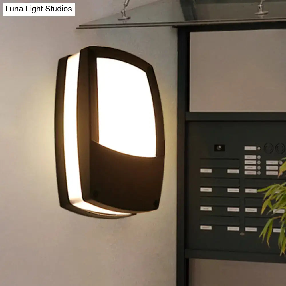Modern black outdoor led wall lamp with sleek curved design and illuminated frosted glass panel mount light fixture