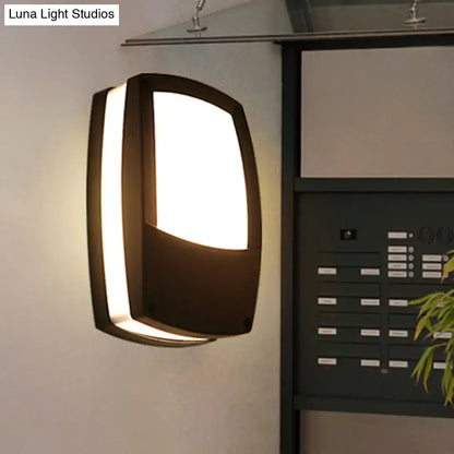 Modern black outdoor led wall lamp with sleek curved design and illuminated frosted glass panel mount light fixture