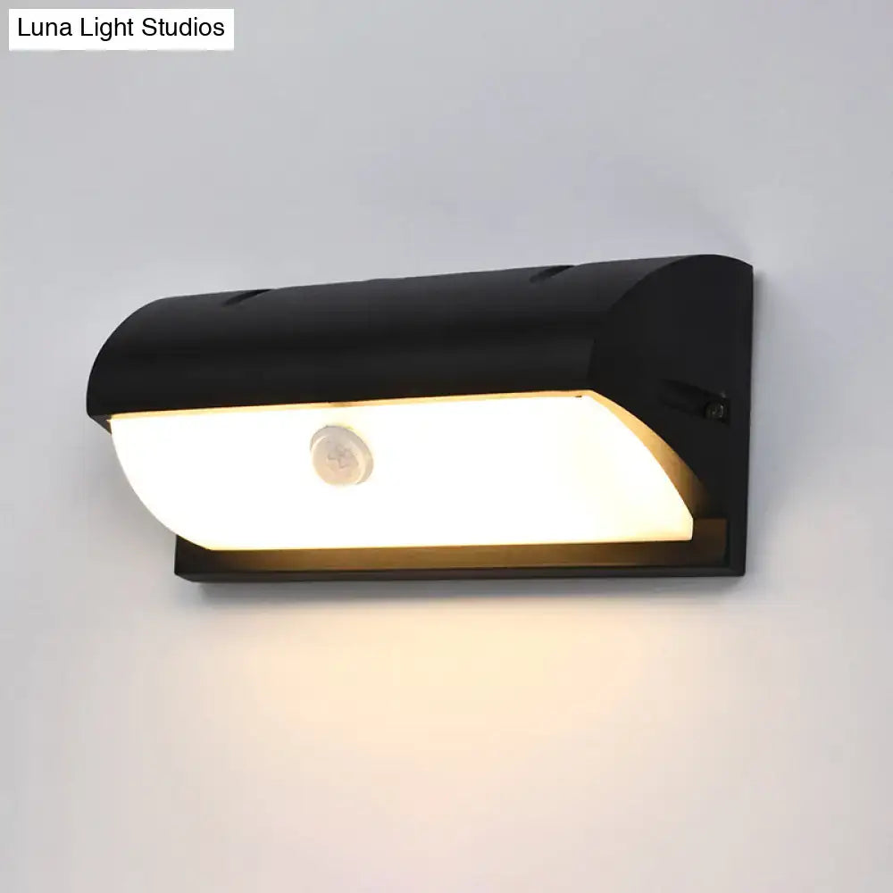 Modern black outdoor led wall lamp with matte finish curved design and warm white illumination motion sensor wall lamp