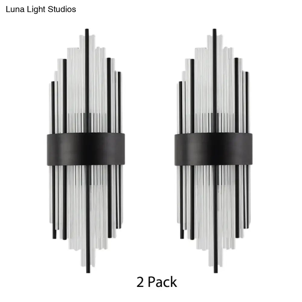 Modern black prism crystal wall light featuring clear glass tube sconces for stylish living room lighting
