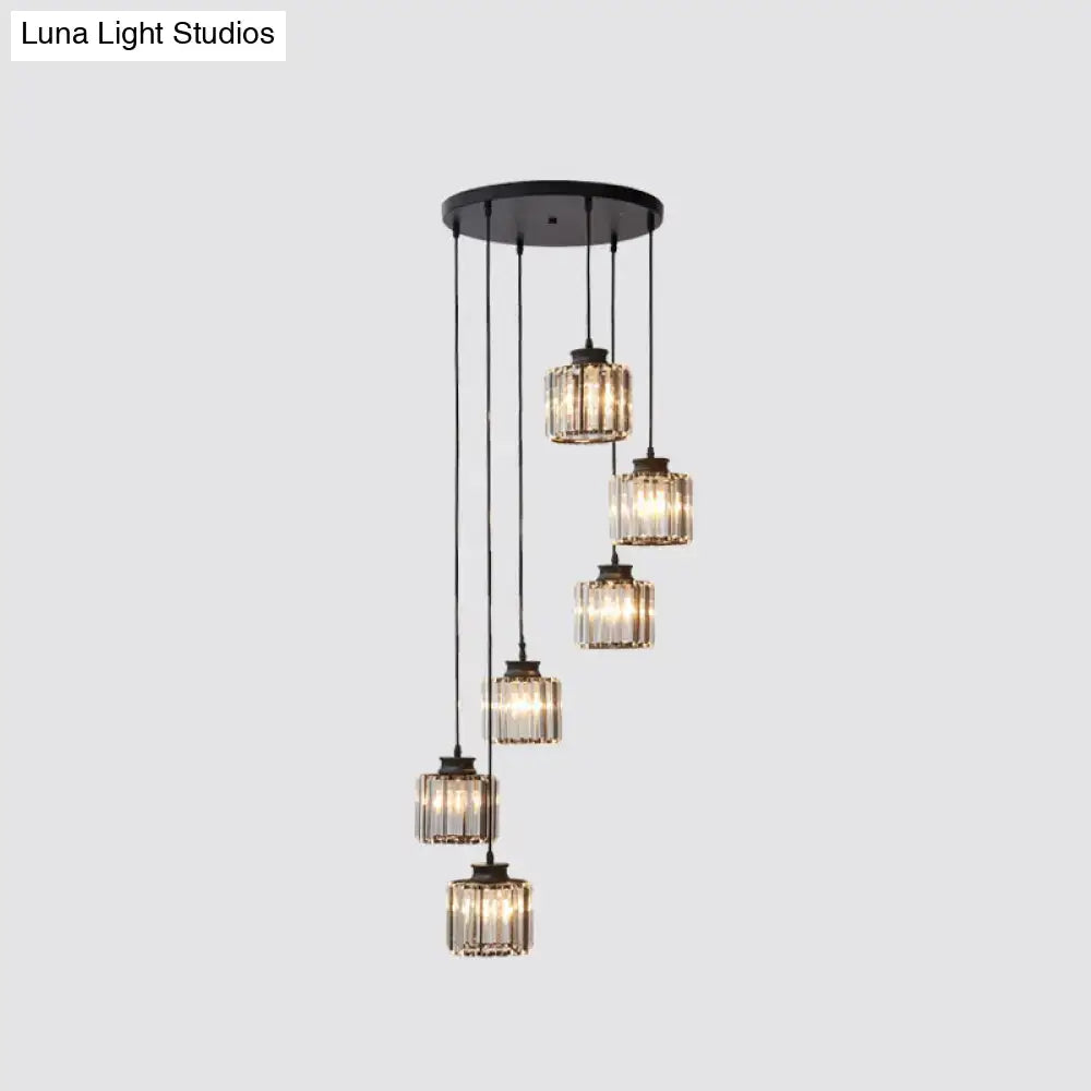 Modern black metal chandelier with five cascading prismatic crystal cylindrical pendant lights for stairway lighting