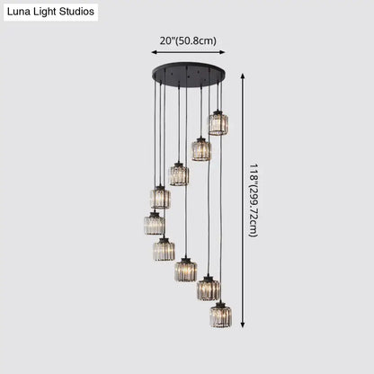 Black metal chandelier with seven cascading prismatic crystal cylindrical pendant lights for stairway lighting