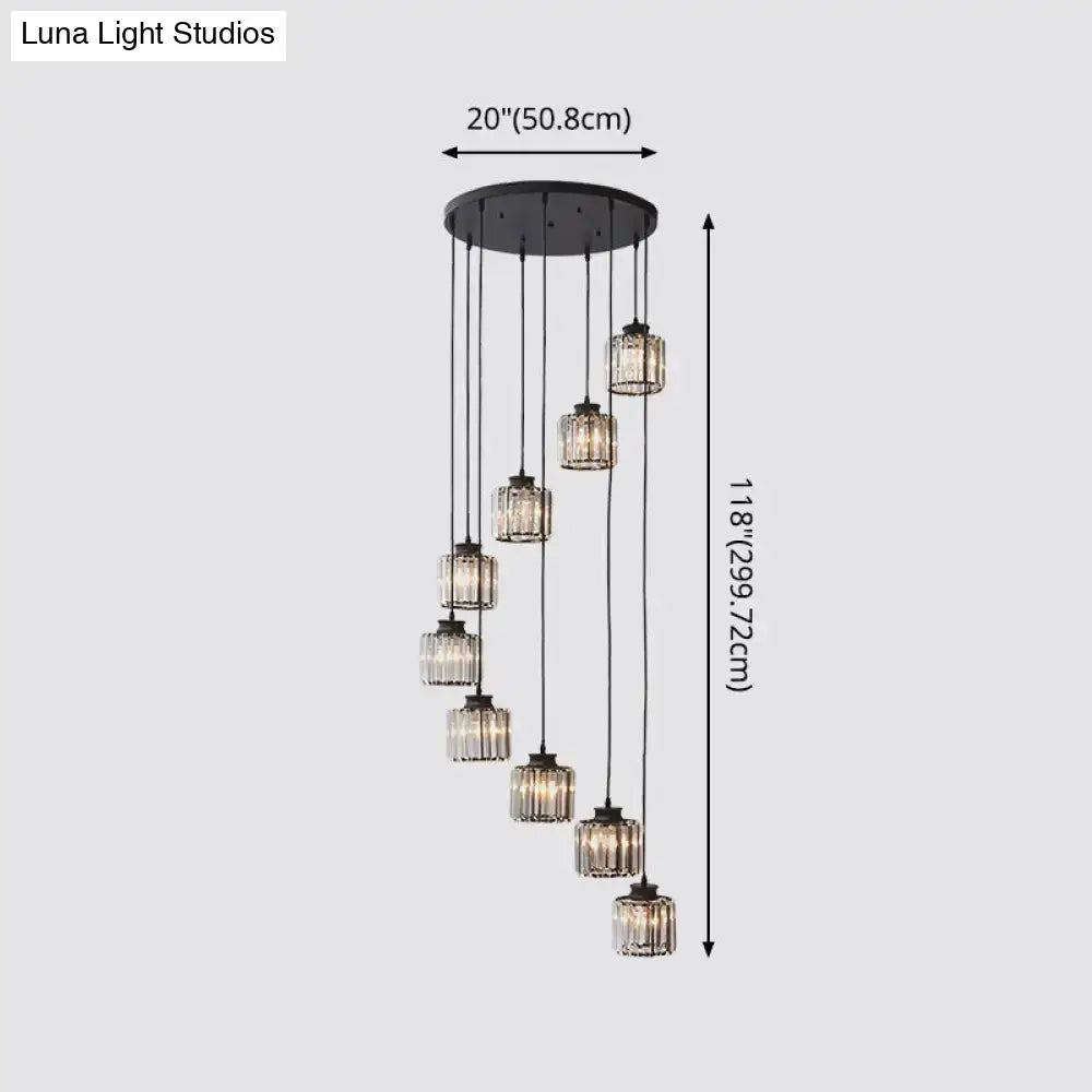 Black circular chandelier featuring seven cascading prismatic crystal cylindrical pendant lights for stairway lighting