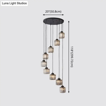 Black circular chandelier featuring seven cascading prismatic crystal cylindrical pendant lights for stairway lighting