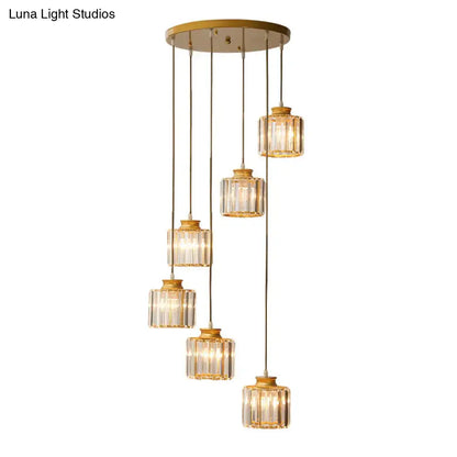 Gold-toned DecorBites™ modern prismatic crystal cylindrical pendant chandelier with five faceted glass shades for stairway