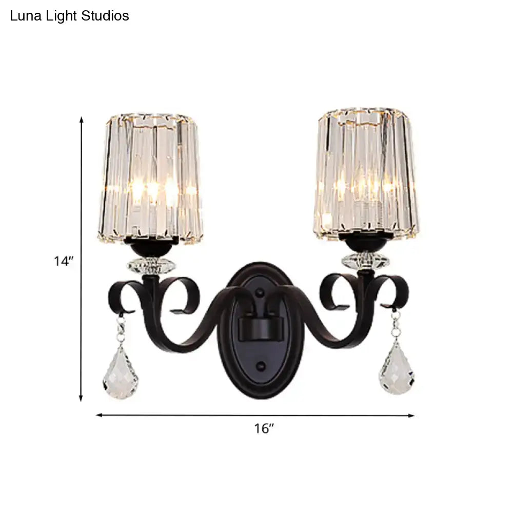 Modern black wrought iron wall mount lamp with dual crystal frames and dangling teardrop crystals for living room