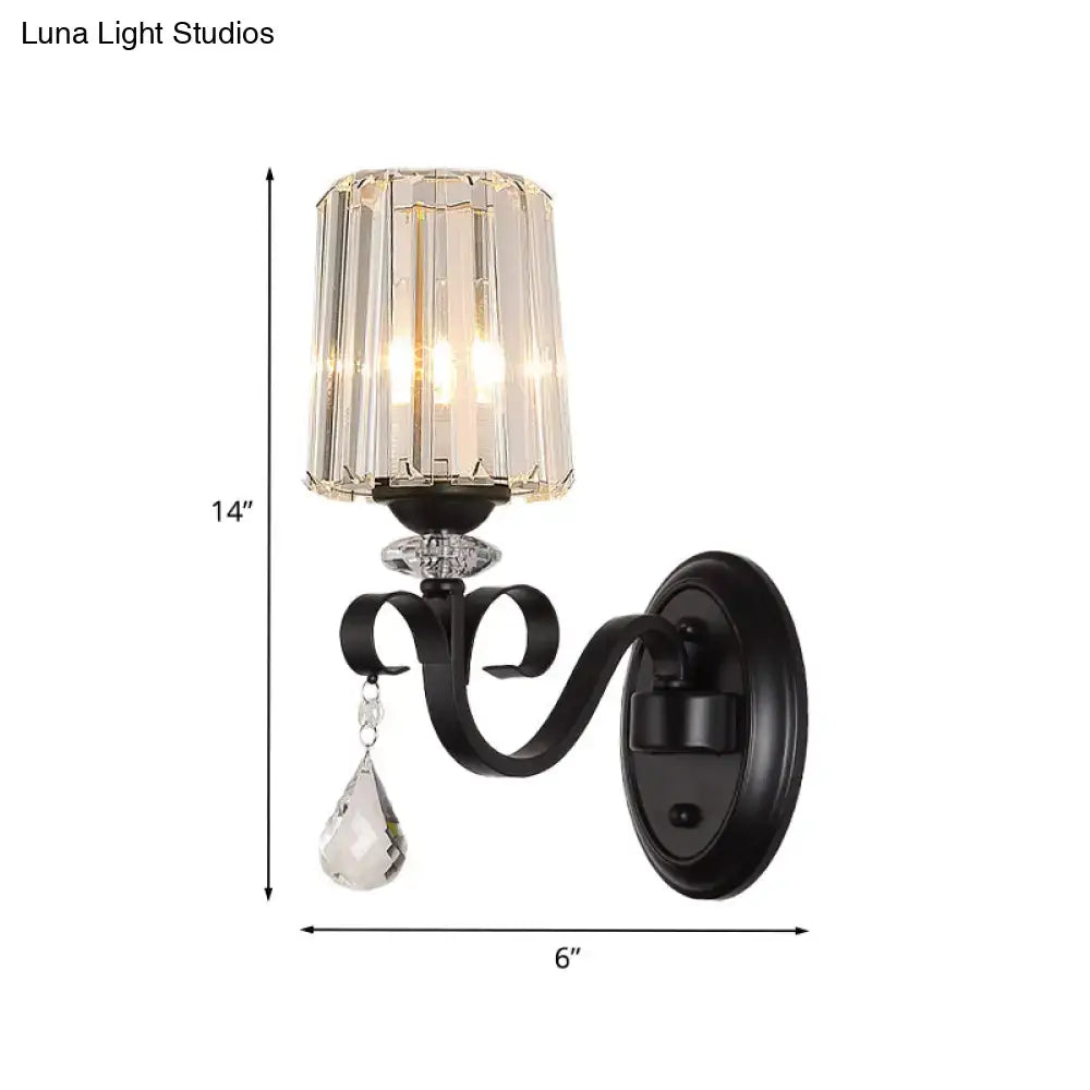 Modern black wrought iron wall mount lamp with faceted crystal shade and dangling teardrop crystal for living room