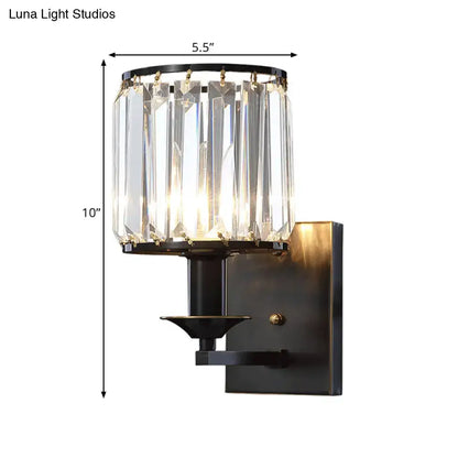 Modern black metal wall sconce with cylindrical clear faceted crystal prisms e12 light type bulb base