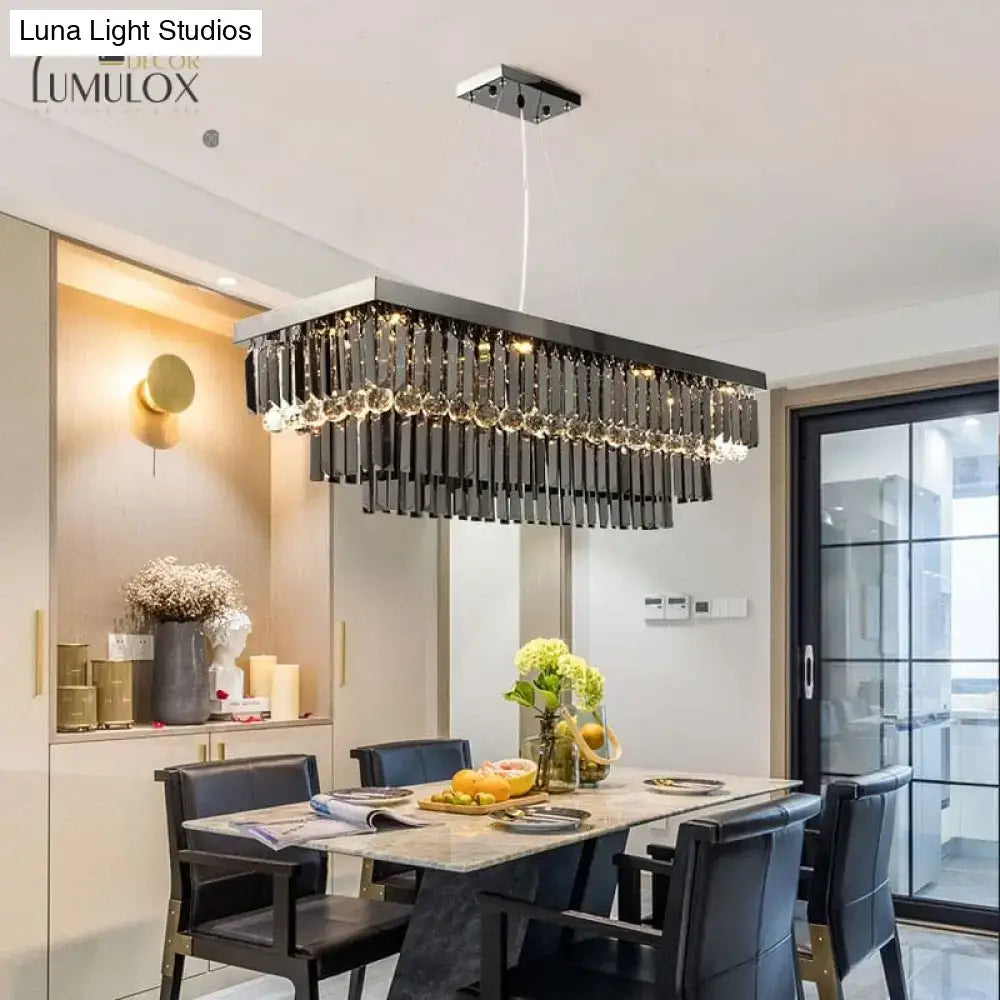 Modern black rectangle crystal chandelier by DecorBites™ Lamis with dangling crystal droplets and a sleek metallic frame