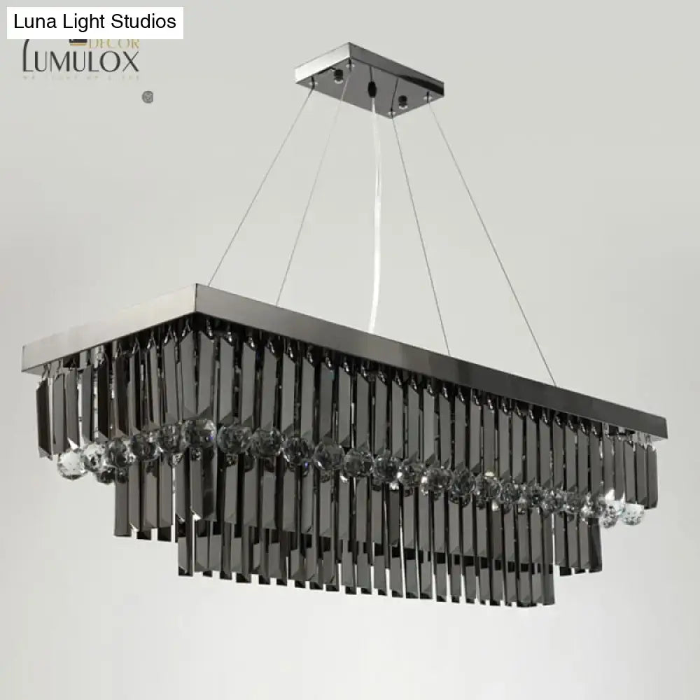 Modern black rectangle crystal chandelier with sleek chrome finish and cascading black crystals accented by clear gemstones
