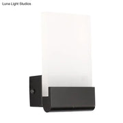 Modern black rectangle led wall sconce with frosted white diffuser and light bulbs included for bedroom lighting