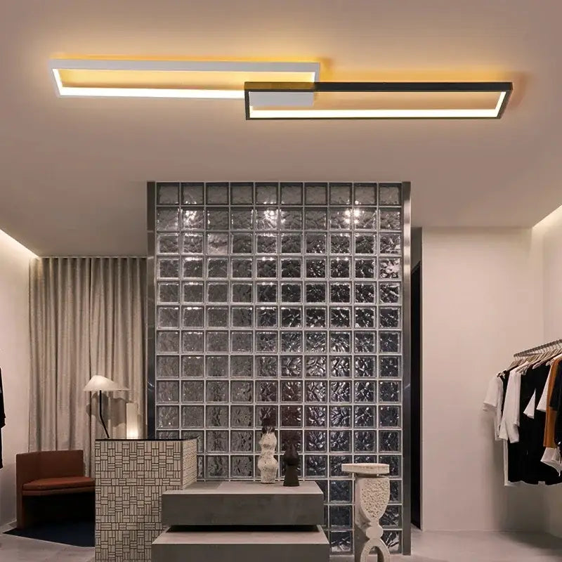 Modern black rectangular led ceiling light with sleek intersecting bars emitting warm white illumination for living room decorbites led ceiling light