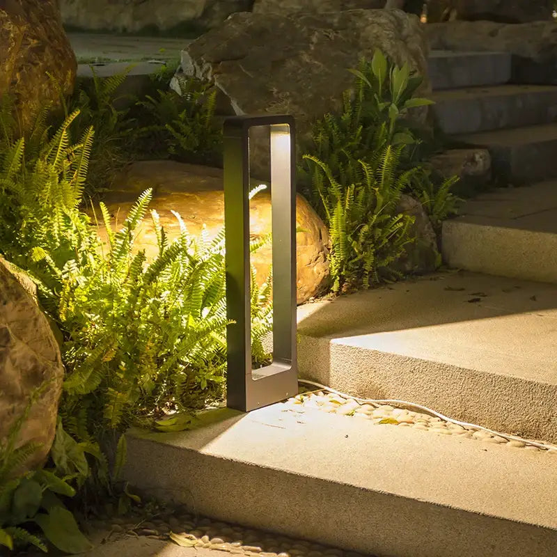 Modern black rectangular led lawn light with sleek minimalist design for garden and landscape lighting