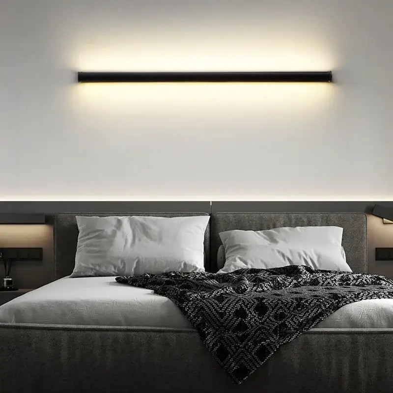 Modern black rectangular led wall lamp with warm white light ideal for living room as stylish led wall sconce