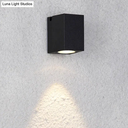 Modern black rectangular mini led wall sconce with matte finish and maximum bulb wattage emitting warm light for patio use