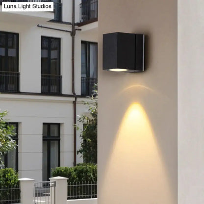 Modern black rectangular mini led wall sconce with sleek design casting warm light and maximum bulb wattage for patio use