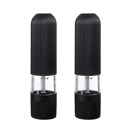 Modern black ribbed automatic salt pepper grinder set with clear glass sections and textured bodies for kitchen use