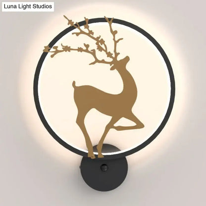 A modern black ring led elk mural wall sconce with golden deer silhouette and softly glowing backlight for bedrooms