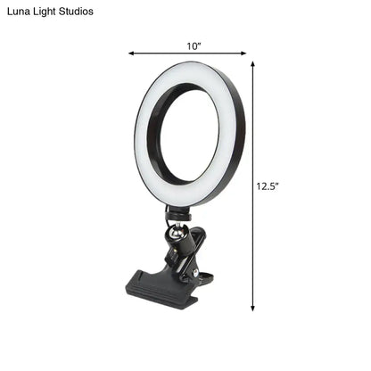 Modern black clip-on ring light with metal shade wall light fixture featuring a 10-inch illuminated led ring